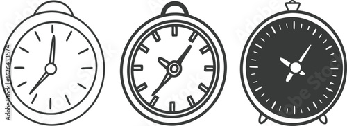 Three vintage alarm clocks in a row