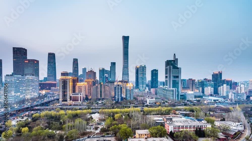 High angle night view Day-to-Night timelapse of International Trade Center CBD complex and overpass in Beijing, China