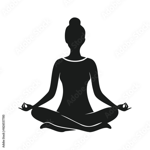 A serene silhouette of a woman meditating in the lotus yoga pose. A vector graphic icon representing mindfulness, spiritual balance, and wellness.