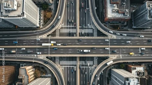 Ai generated aerial view of a busy city traffic intersection with cars and overpasses, representing urban transportation and infrastructure 4k video
