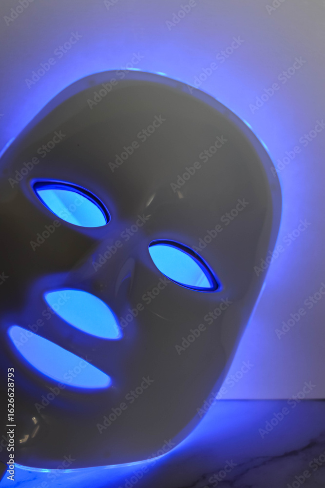 Beauty LED mask covering female face Beauty LED mask covering female face