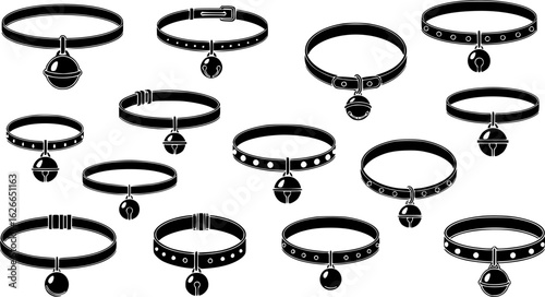 Diverse collection of black collars with pendant bells on a white background
