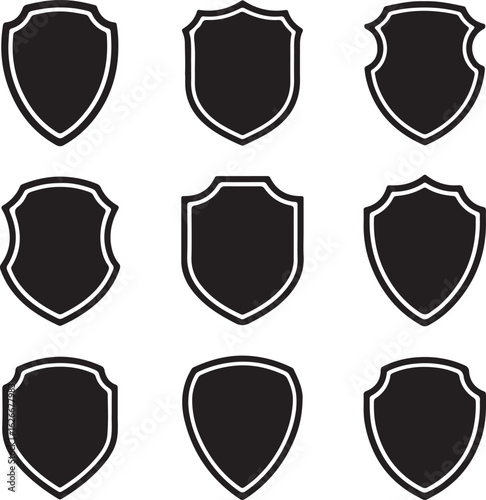 A set of classic heraldic shield emblems with laurel wreath and gold metal accents for security and protection design