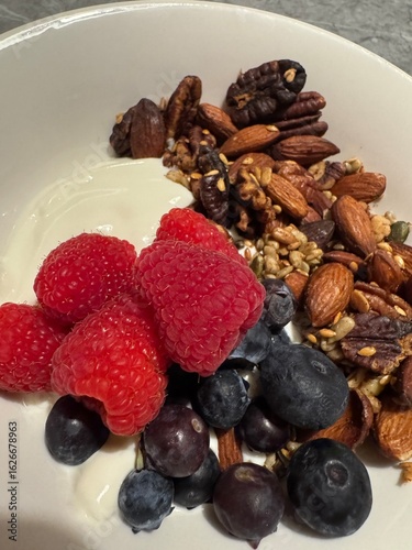 Home made Granola and Yogurt Bowl with Fresh Fruit