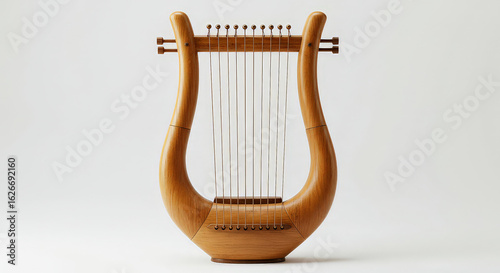 Isolated wooden lyre instrument with strings on a white background