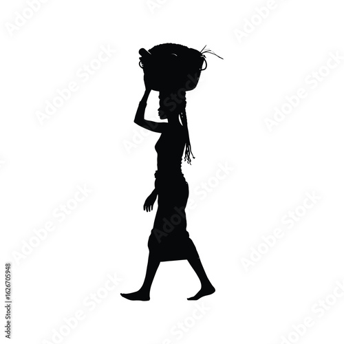 Silhouette of African Woman Carrying a Basket on Her Head Walking Black and White