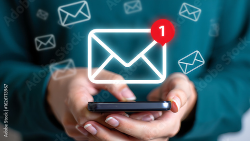 Wallpaper Mural Hands holding phone with glowing email icons and notification message communication Torontodigital.ca