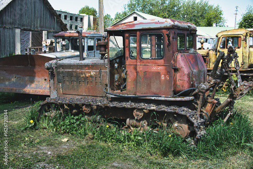 Rusty Soviet Bulldozer in an Abandoned Machinery Yard