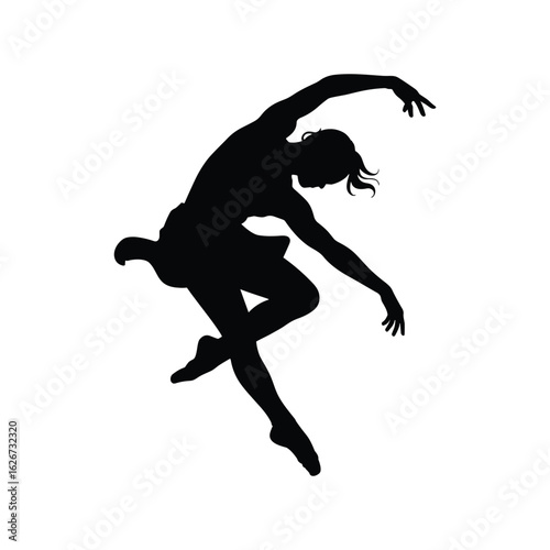 Silhouette of a graceful female ballet dancer in mid leap
