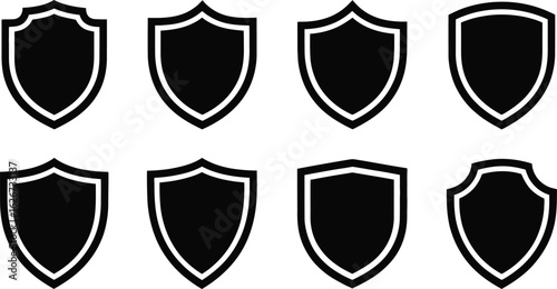 Collection of eight black shield icons with white outlines on a white background