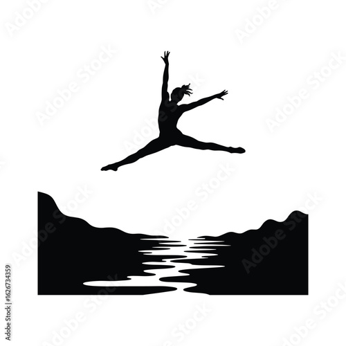 Silhouette of a dancer leaping over a reflective body of water with mountains