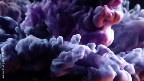 Abstract cloud of purple and blue swirling in motion