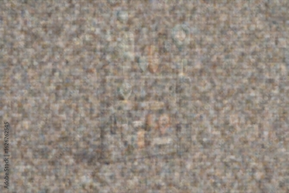 Fototapeta premium Colorful artwork composed of pebbles arranged on a sandy beach during the afternoon sunlight, showcasing natural colors and textures Generative AI