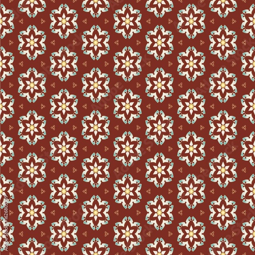 Seamless Moroccan pattern. Red concept combines geometric and floral patterns. Inspired by Moroccan style. Design for interior, textile and wallpaper. The pattern still maintains the Moroccan art well