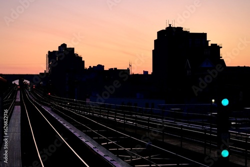 Glowing Subway Tracks and Signals at Sunrise (Queens, New York, USA)