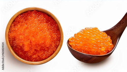 orange fish roe in the small wooden spoon and bowl isolated background orange tobiko fish roe