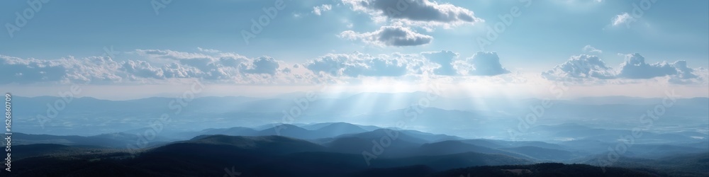 Fototapeta premium Serene mountain landscape with sunbeams and cloudy sky