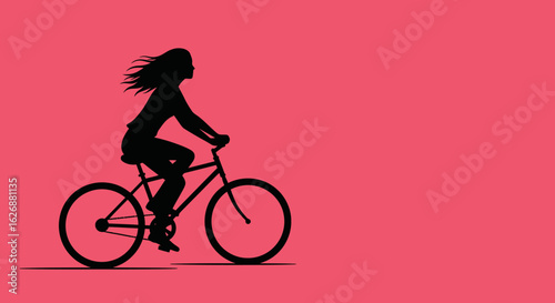 Silhouette of a Woman Riding a Bicycle with Flowing Hair.