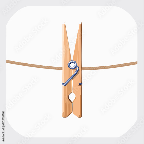 Wooden clothes peg on fabric line
