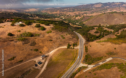 Carmel Valley view of Corral de Tierra into Salinas Valley. Late afternoon aerial view.
