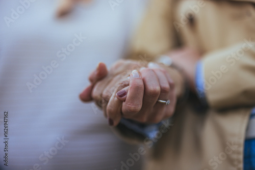 Close-Up of Elderly Hands Holding in a Gesture of Love and Support