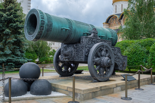 Tsar Cannon in the Kremlin, Moscow. Massive decorative bronze cannon from the 16th century, a historic artifact and popular tourist attraction near Orthodox churches and Kremlin walls in Russia.