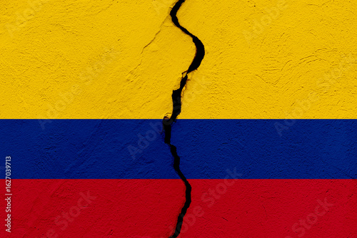 The flag of the Republic of Colombia into a grunge cracked wall