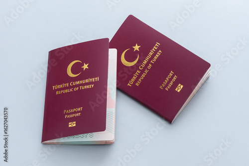 New Turkish citizen public passports on the blue background.