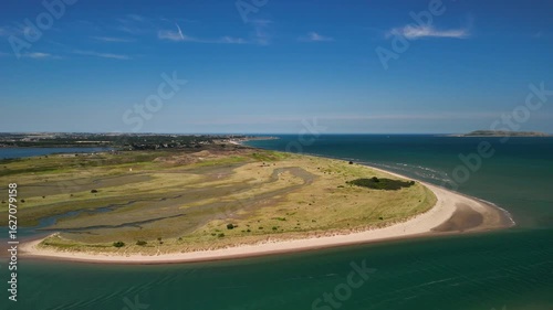Slow fly right with views of Lambay Island, ships entering the Irish Sea and Malahide Beach.