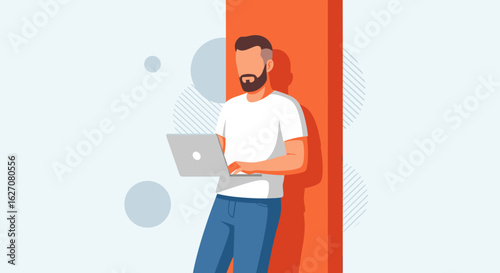 Modern man with beard casually using a laptop, leaning against an orange wall in a minimalist setting. Ideal for business, remote work, or technology concepts.