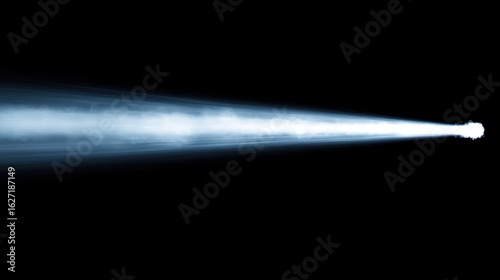 Blue spotlight beam cutting through dark smoky air.