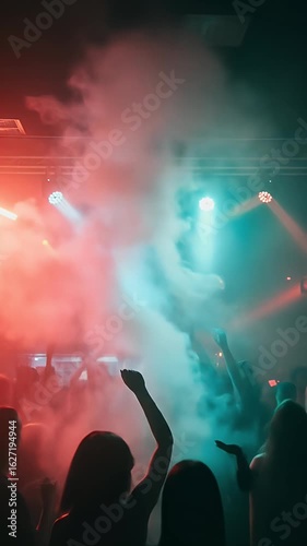 Vibrant Nightlife Scene Crowded Dance Floor with Smoke and Lights