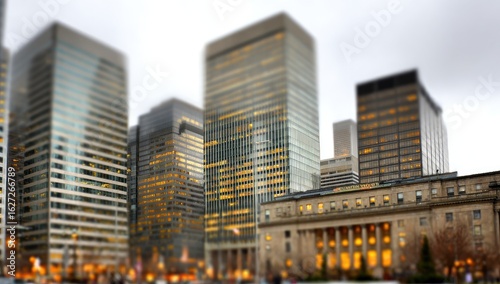 Blurry cityscape of modern and older buildings