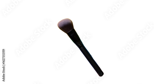 Iridescent makeup brush on black background