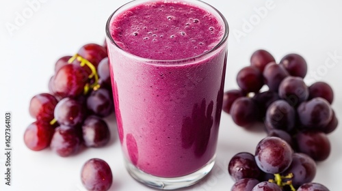 Wallpaper Mural A large glass filled with purple grape smoothie, surrounded by fresh grapes, on a clean white background. Torontodigital.ca