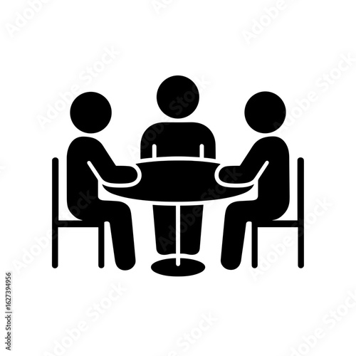 Three people sitting at round table icon with solid fill representing teamwork and discussion