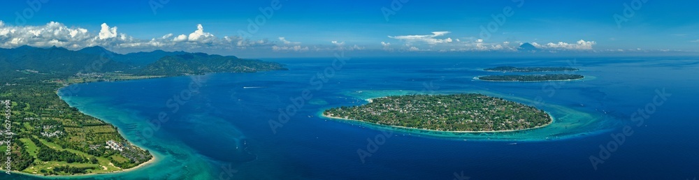 Aerial views of Gili Air captured in May 2025. Crystal-clear waters, coral reefs, and tropical coastline from above — showcasing the island’s serene beauty and vibrant marine life. Aerial views of Gili Air captured in May 2025. Crystal-clear waters, coral reefs, and tropical coastline from above — showcasing the island’s serene beauty and vibrant marine life.