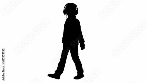 Silhouette of a child walking with headphones on enjoying music in a simple yet captivating composition