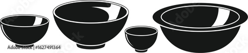Four minimalist black bowls of varying sizes arranged horizontally