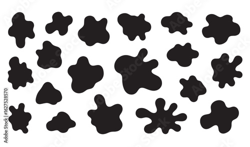 Vector illustration of black splatters and stains on a white background design elements