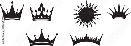 Assortment of black silhouette crowns and sunbursts on a white background symbol royal