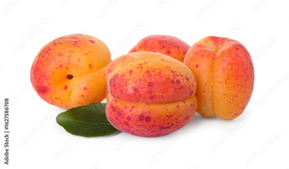 Fresh ripe apricots and green leaf isolated on white Fresh ripe apricots and green leaf isolated on white