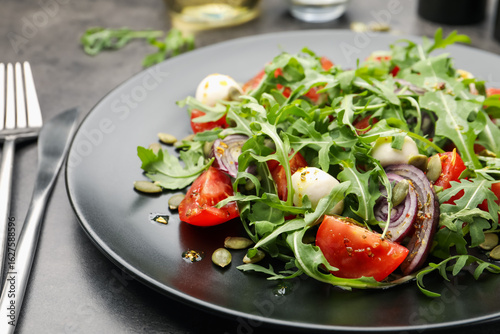 Wallpaper Mural Tasty salad with arugula, mozzarella and vegetables served on grey table, closeup Torontodigital.ca