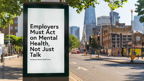 Bus stop billboard poster reading “Employers must act on mental health, not just talk” on London street with city buildings