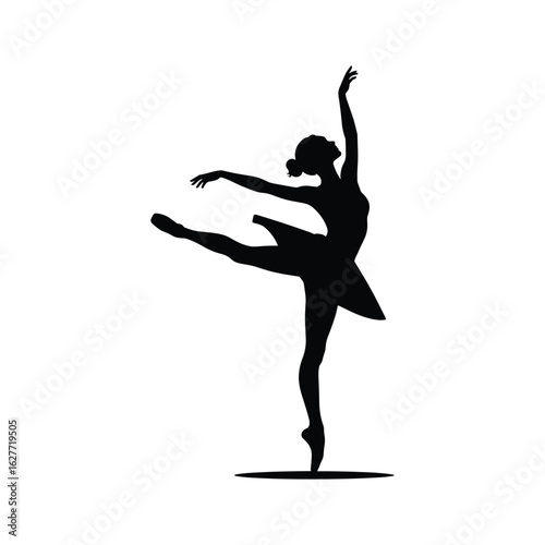 Silhouette of a graceful ballerina performing an arabesque pose on pointe shoes