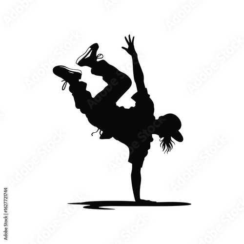 Silhouette of a breakdancer performing a dynamic handstand on a white background