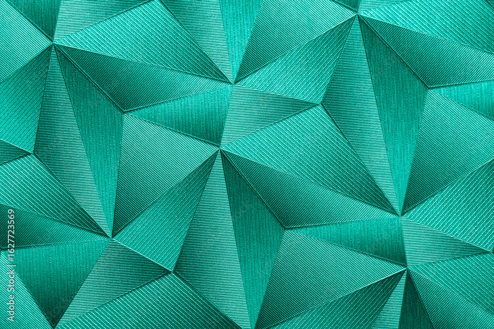 Obraz premium Shiny turquoise background with geometric patterns. Abstract texture.