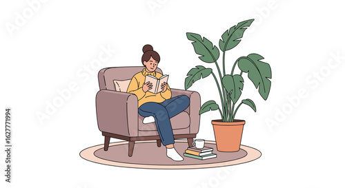 A young woman enjoys quiet time reading a book while relaxing in a comfortable armchair next to a tall houseplant
