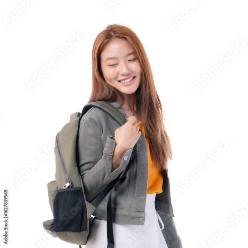 Smiling Asian female student with backpack standing isolated on a transparent background, young university or high school girl in casual outfit ready for school or campus life with cheerful expression