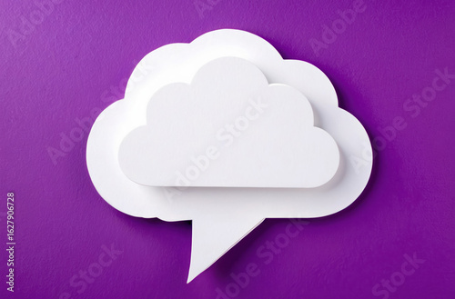 White cloud speech bubble on purple. Communication, thoughts and ideas. Simple design against vibrant backdrop.
